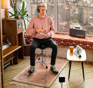 Drummer playing Aerodrums 2 at home